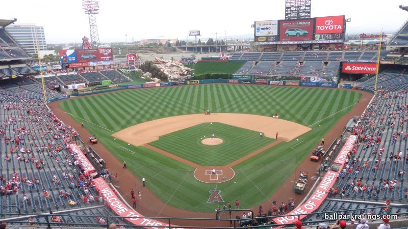 A giant United States flag is stretched across the outfield of Truist Park  as military jets fly overhead in observance of Memorial Day before a  baseball game between the Washington Nationals and