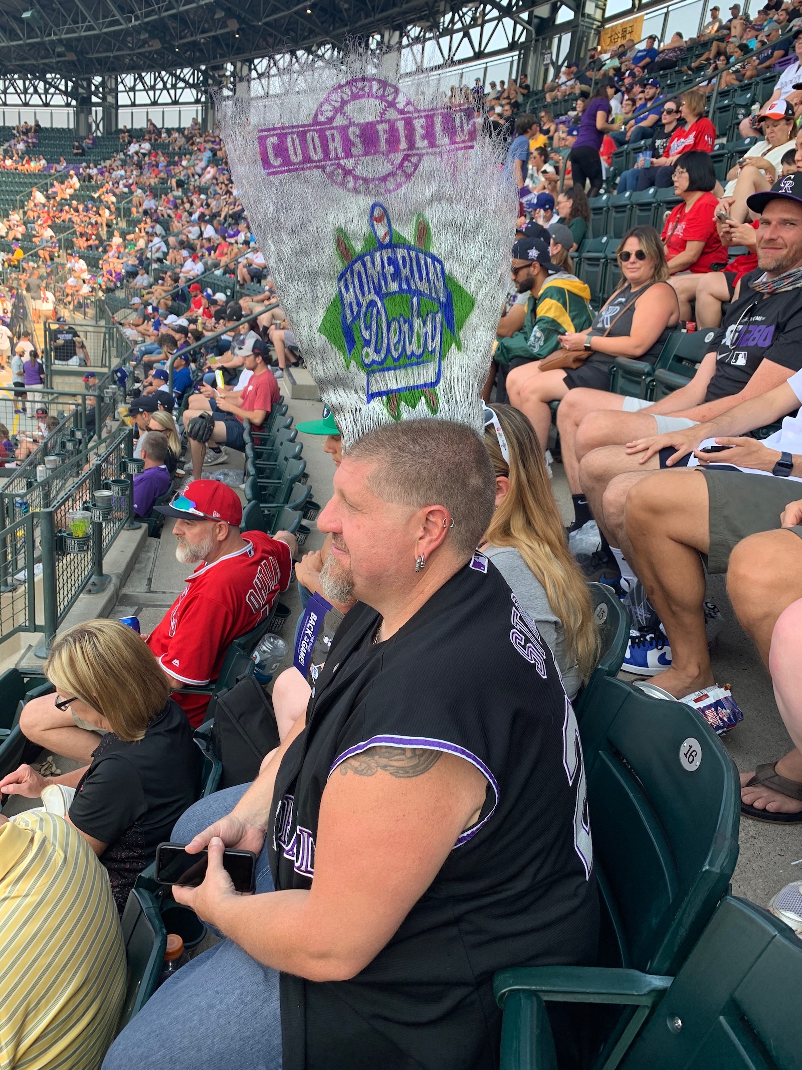 Crowds stream into Coors Field, home of the Colorado Rockies