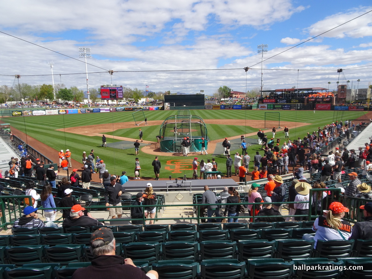 Dinger, the Colorado Rockies' mascot, interacts with fans at a spring  training major league baseball game between the Rockies and the Arizona  Diamondbacks at Salt River Fields stadium in Scottsdale, Arizona. Dinger