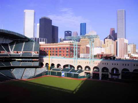 Houston Skyline lit up at night with Minute Maid Park Poster for